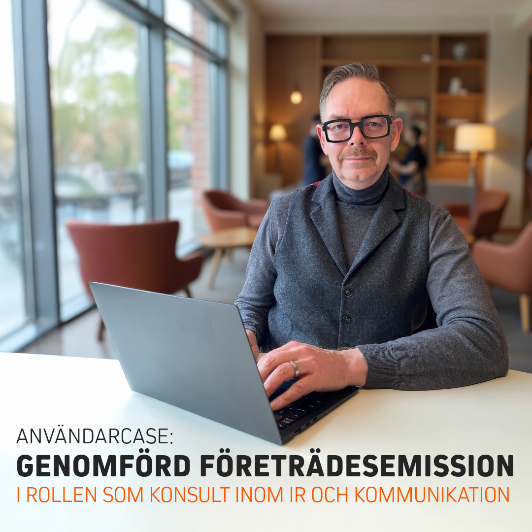 Konsult arbetar vid laptop i kontorsmiljö med fokus på affärsutveckling och investerarkommunikation.