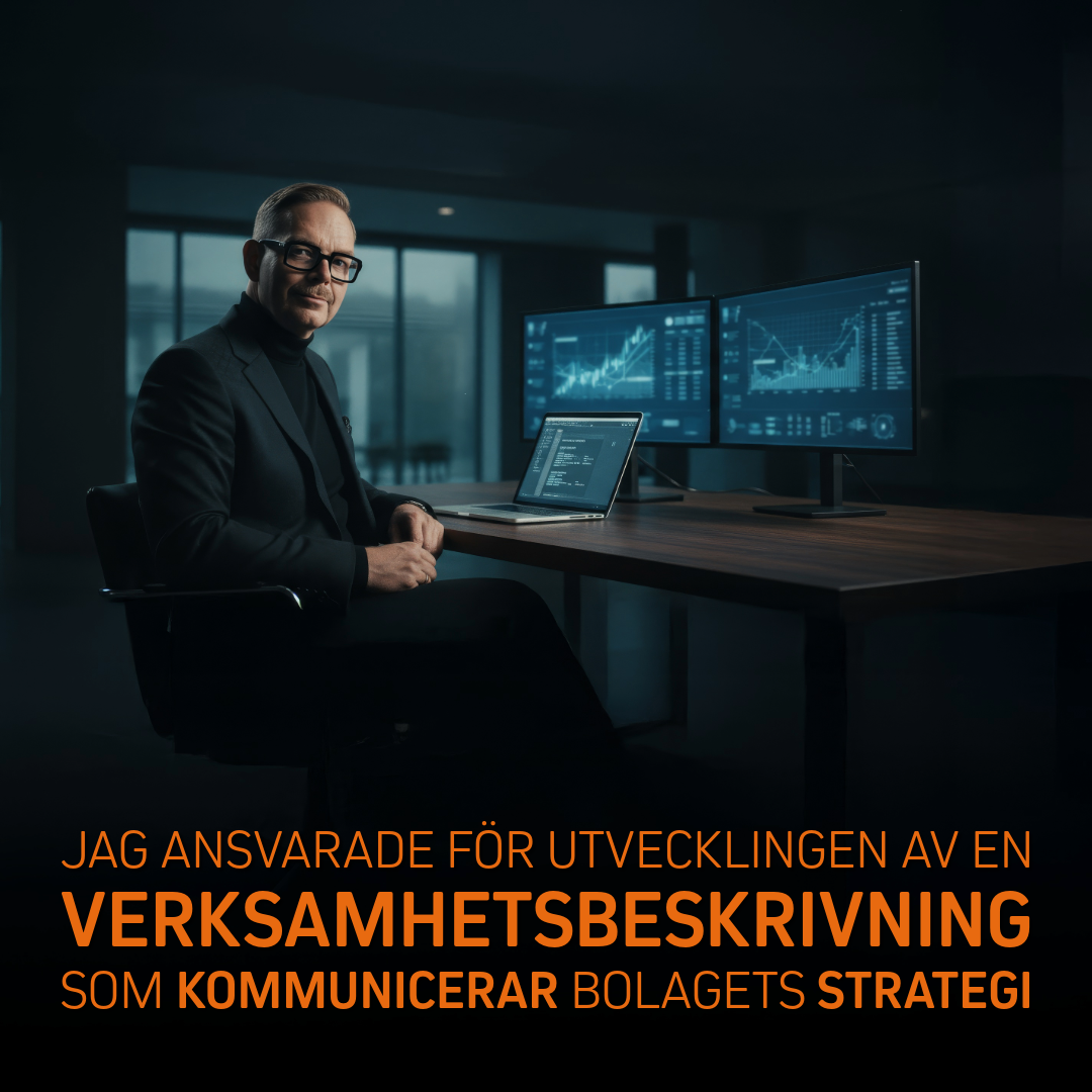 Person i formell kostym sitter vid ett skrivbord med en dator och två skärmar som visar affärsdata och diagram.