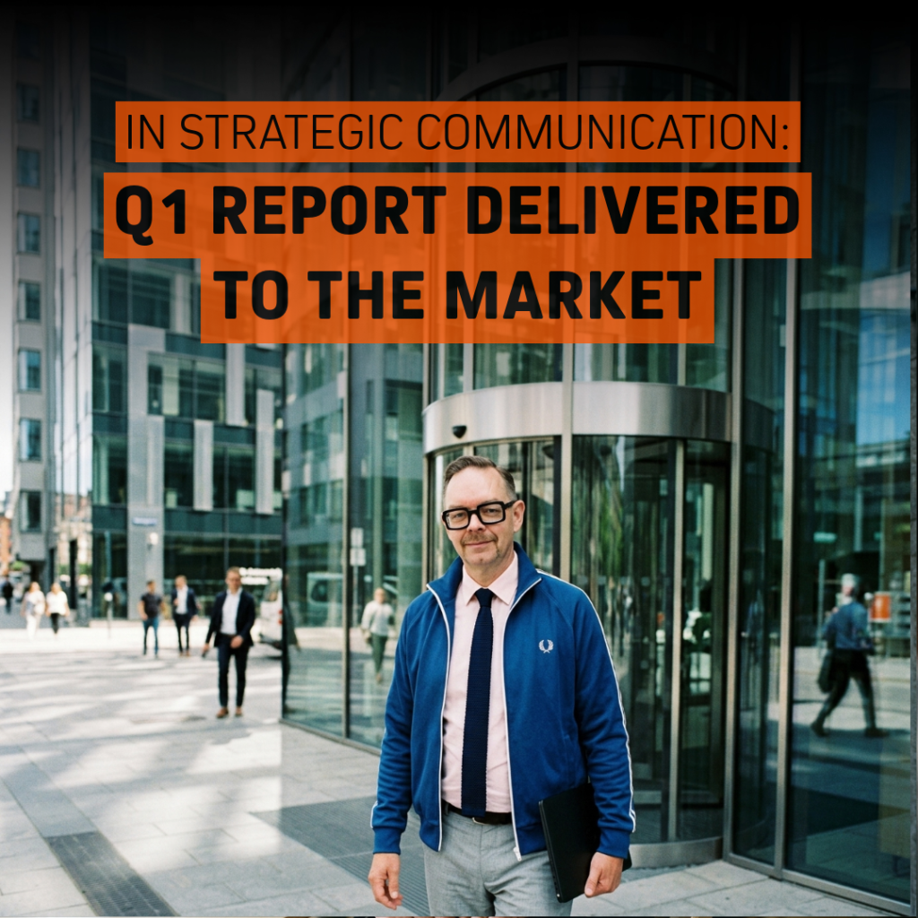 En kvartalsrapport har levererats till marknaden och kommuniceras vid en modern kontorsmiljö. En man i blå jacka och slips går framför en glasentré medan texten "Q1 REPORT DELIVERED TO THE MARKET" markerar en levererad kvartalsrapport.